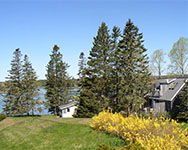 The Pine Cottage to the left with Bass Harbor in the background